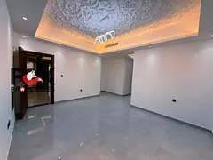 A bedroom and living room for annual rent in the Al-Aaliyah area, in a first-occupant building, with