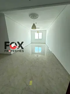 For annual rent, 2-bedroom apartment in Al Nuaimiya 3 with central AC, open-view balcony, free parki