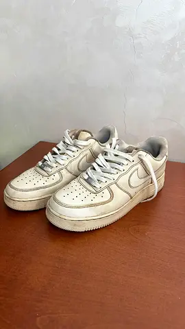Used white Nike-style sneakers, size approx. EU 45 - casual wear