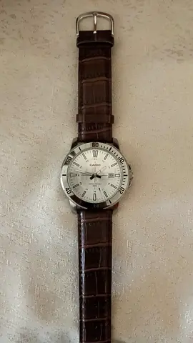 Casio mens analog watch with brown leather strap