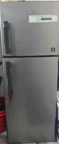 Whirlpool stainless steel double-door refrigerator - good working condition