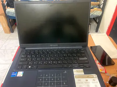 ASUS Vivobook laptop - Intel Core i7, 14-inch, good condition