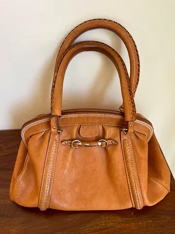CHRISTIAN DIOR Vintage Tan Leather Handbag with Horsebit Detail — Good Condition.
