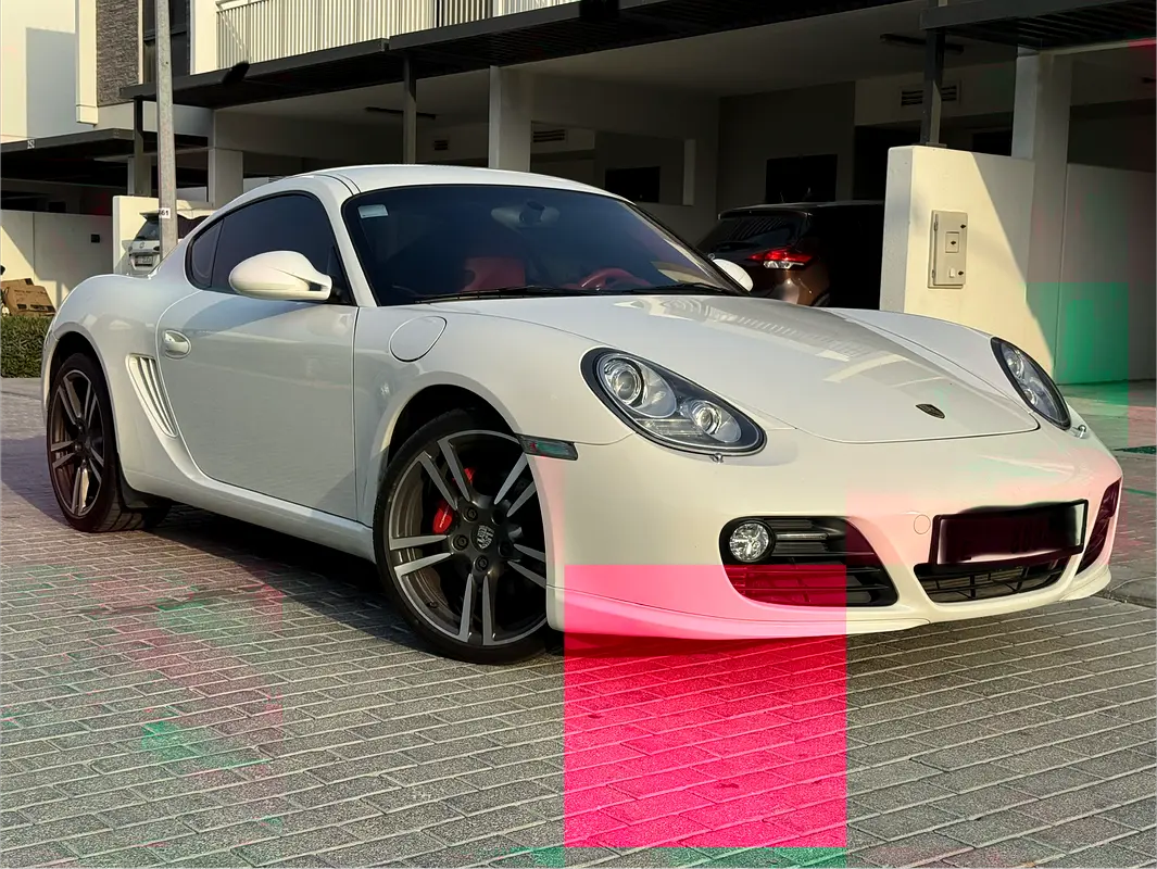 Porsche Cayman 2012 — photo 1 of 18