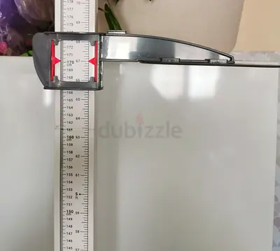 Height measuring scale