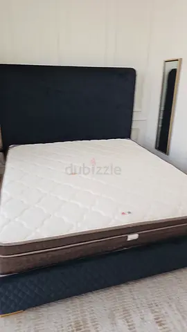 Queen size bed with mattress and upholstered headboard - good condition