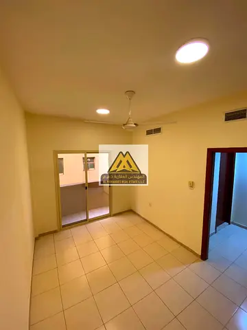 1-bedroom apartment with living room in Al Hamidiya, Ajman, spacious layout, second tenant, balcony with open view, AED 26,000 in 4 installments, prim