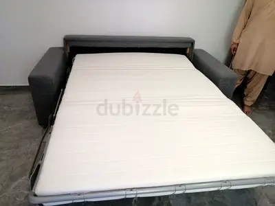 Grey 2-seater Sofa Bed with Fold-out Mattress - Good Condition