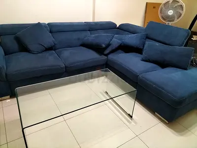 L-shaped navy blue fabric corner sofa with cushions Sofa bed and two storage units big size