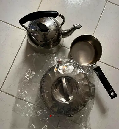 Stainless steel kettle, saucepan and small pot - used set