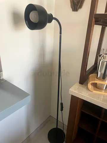 Black curved floor lamp with adjustable head - good condition