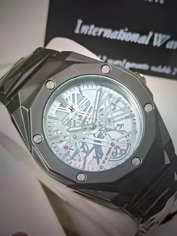Mens stainless steel skeleton dial watch - automatic movement