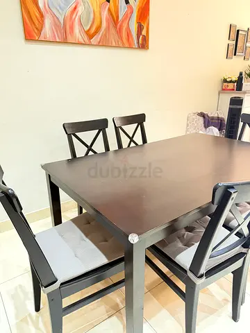 Solid Dark Wood Dining Table with 4 Chairs - Good Condition