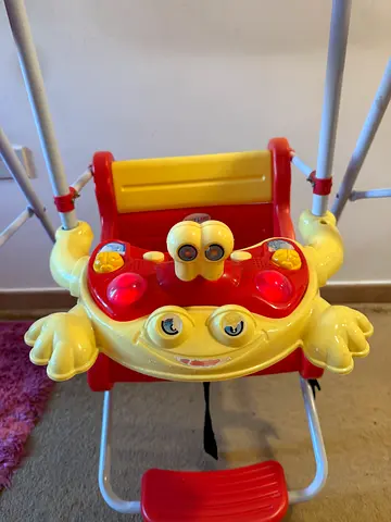Baby activity jumper with interactive toy tray - gently used