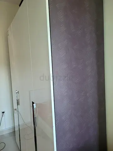 White 4-door wardrobe with mirror inside excellent condition - multiple shelves and drawer-1.6mx0.6m