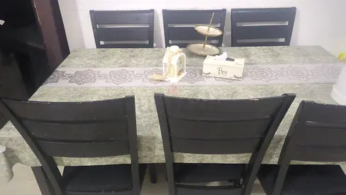 Dining table with 6 wooden chairs
