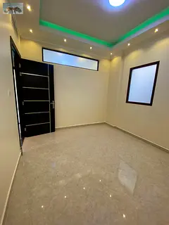 For annual rent in Ajman a spacious three bedroom apartment with a living room in a brand new buildi