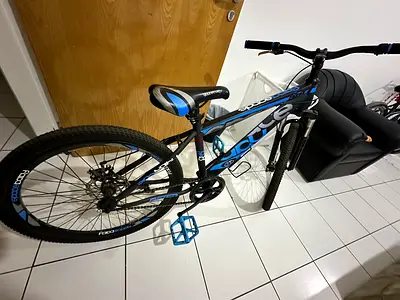 Used blue and black mountain bike - size 24  - good condition