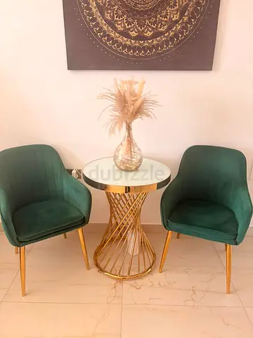Pair of Green Velvet Accent Chairs with Gold Side Table