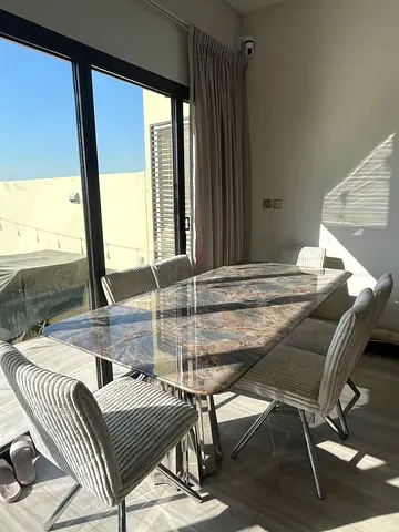 Marble-effect Glass Dining Table with 8 Upholstered Chairs