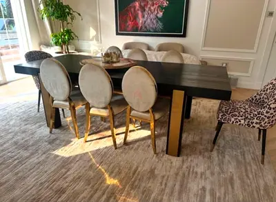 Solid wood dining table with 8 upholstered chairs - excellent condition