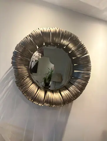 Elegant Round Decorative Wall Mirror with Textured Chrome Frame from The One