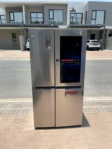 LG side by side refrigerator instaview neat and clean , knock door perfect working