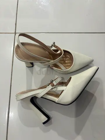 White pointed toe slingback high heels