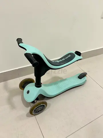 Kids three-wheel ride-on scooter - mint green, good condition