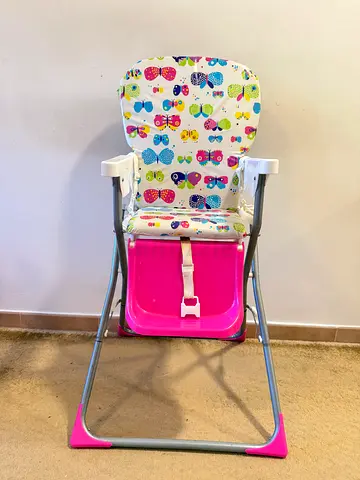 Foldable baby high chair with colorful owl print - good condition