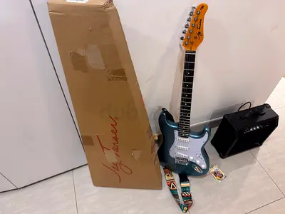 Jay Turser Electric Guitar  Sound Amplifer