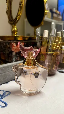Used womens perfume bottle (partially full) - floral scent