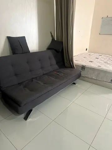 Compact grey convertible sofa bed - good condition a complete home setup items