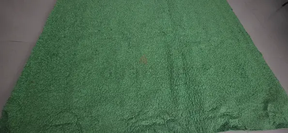 Green shaggy rug - large, soft pile, used