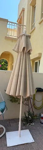 Beige Outdoor Patio Umbrella with Metal Base - Good Condition