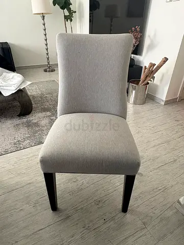 6 light grey upholstered dining/side chair and with wooden legs from The One - excellent condition.