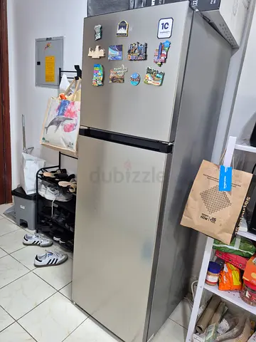 Used stainless steel double-door refrigerator - good working condition
