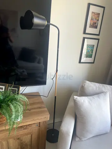 Black adjustable arced floor lamp with wooden accent (good condition)