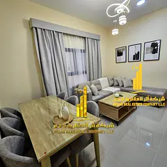 Luxury apartment, second occupancy, two bedrooms, living room, and balcony. Ajman Corniche. Fully fu