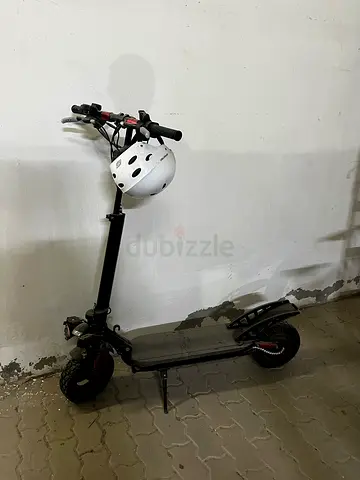 Electric kick scooter with helmet - used, working