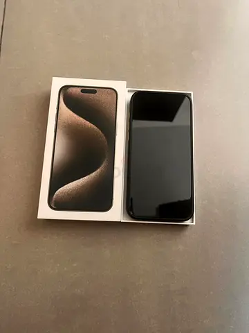 iPhone 15 pro max 256gb TDRA ( Natural Titanium ) with box minor crack on the screen.