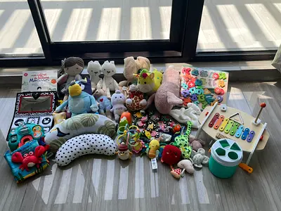 Large bundle of mixed baby toys and plushies - new, good condition