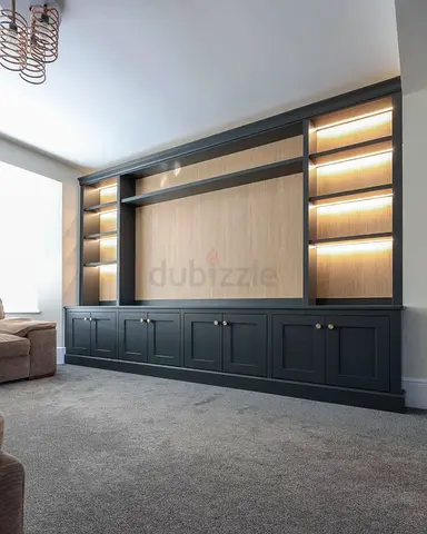 Built-in Entertainment Wall Unit with Shelving and Cabinets