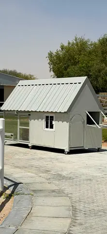 Stylish Dog Kennel with a Red Roof