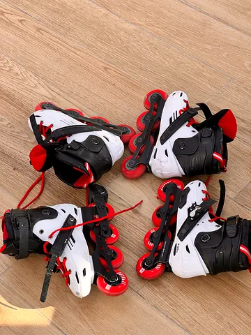 2 Pair of adjustable inline skates (white, black  red) - good condition mf500 oxelo size  40,41