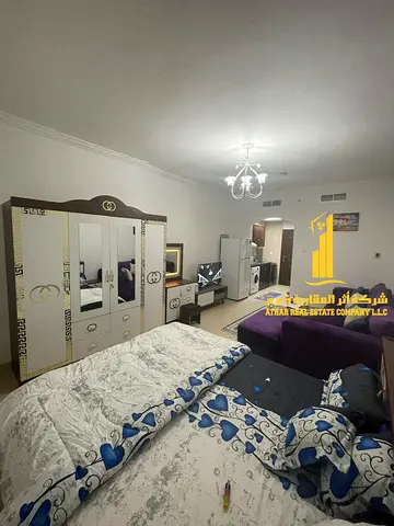 A luxurious, fully furnished studio apartment with brand new, high-end furniture in a prime location with a private parking space within the towers.