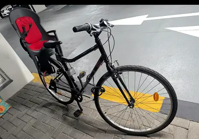 Used city bike with child seat — good working condition