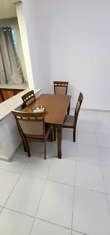 Solid wood 4-seater dining table with chairs — compact set