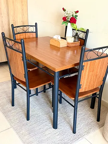 Compact 4-Seater Dining Table with Wood Finish Top and Metal Frame