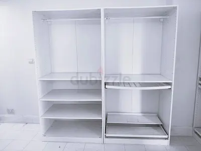 White Ikea Pax  Oprn Wardrobe Frame with Shelves and Pull-Out Shoe Racks.